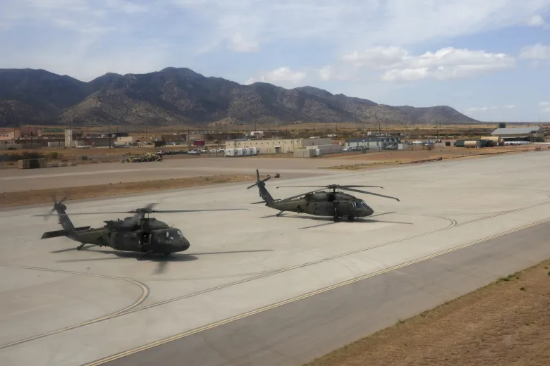 U.S. Army Blackhawk helicopters sit on the tarmac at Fort Huachuca on April 3, 2025, in Sierra Vista, Ariz. (AP Photo/Ross D. Franklin)